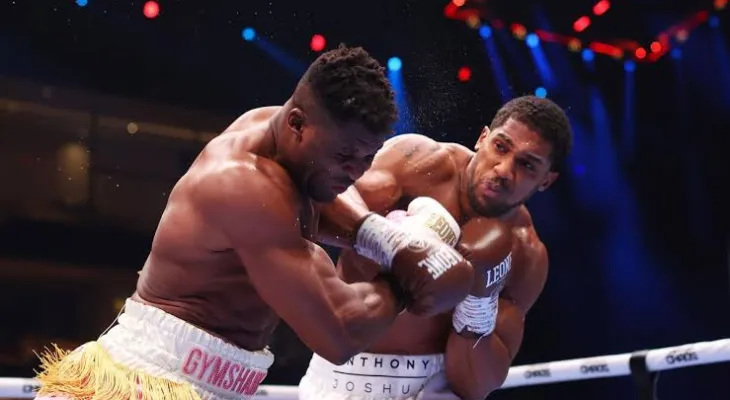 Anthony Joshua Dominates Francis Ngannou in Heavyweight Boxing Showdown