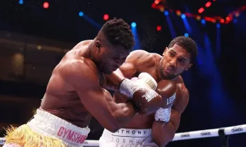 Anthony Joshua Dominates Francis Ngannou in Heavyweight Boxing Showdown