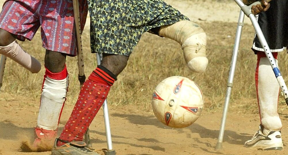 Amputee football players using crutches during a tournament in Uvira, Democratic Republic of the Congo