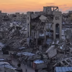 Palestinians sheltering amid damaged buildings and temporary camps in Gaza