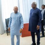 Former President Ernest Bai Koroma and President Julius Maada Bio at State House in Freetown