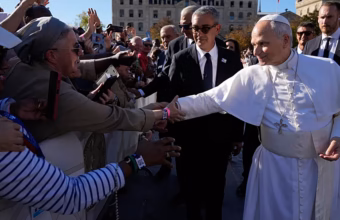 French President Emmanuel Macron welcomes Pope Leo XIV at the Élysée Palace