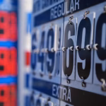 Oil market imagery representing falling crude prices amid regional tensions involving Iran and Saudi Arabia