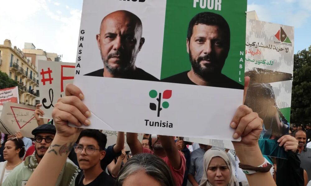 Supporters and families of activists linked to the Global Sumud Flotilla outside a Tunisian court