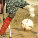 Amputee football players competing with crutches during a tournament in Uvira, Democratic Republic of the Congo
