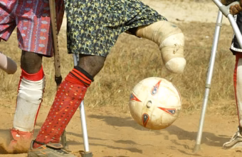 Amputee football players competing with crutches during a tournament in Uvira, Democratic Republic of the Congo