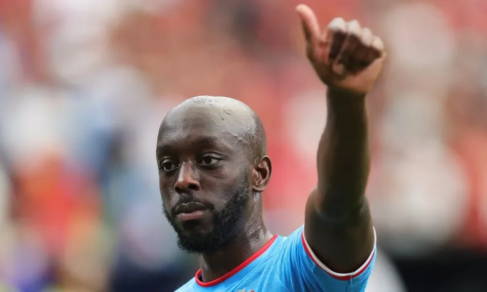 Yoane Wissa celebrates during the Democratic Republic of the Congo's Africa Cup of Nations qualifying win over Zimbabwe