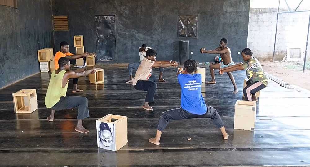 Deaf and hard-of-hearing dancers practising the Vibra-Signe technique at Au Déla de l’Handicap in Bobo-Dioulasso