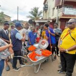 Community cleaning and drainage clearing exercise in the Western Area