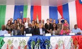 Peace Corps volunteers working with teachers and pupils in Sierra Leone