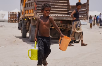 Displaced families from Hays living in tents and receiving humanitarian assistance in Yemen